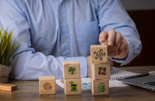 front-view-man-with-wooden-blocks