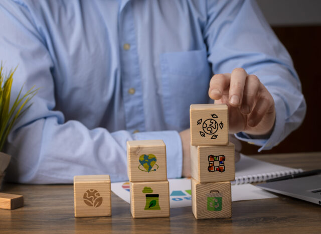 front-view-man-with-wooden-blocks